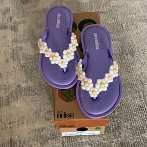 Mini Melissa child size 12 “ Barbie daisies” slip on.